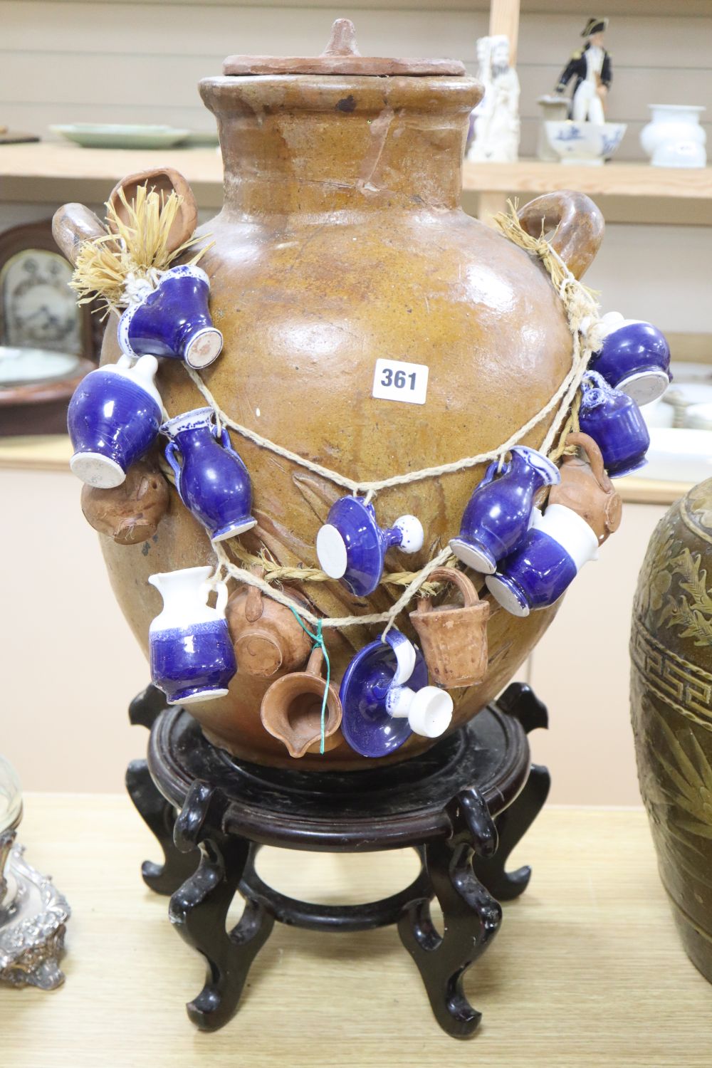 A Chinese straits earthenware matavan and a stoneware vessel on stand